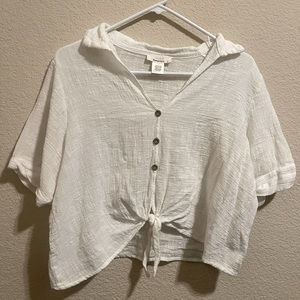 Large white crop top ties in the front